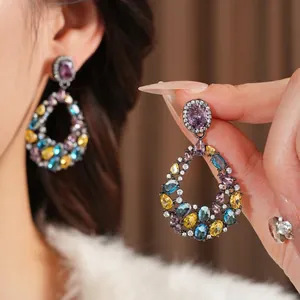 Vintage teardrop hollow earrings featuring colorful zircons in gunmetal finish