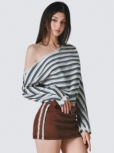 Women's blue striped off-shoulder long sleeve top with lace trim and suede skirt