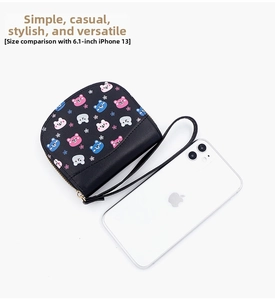 Compact cartoon bear wallet size comparison with a 6.1-inch smartphone on white background