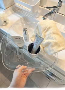 Detailed view of deep transparent plastic washbasin with 5000ml capacity scale marks