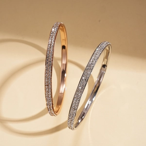 Minimalist double-row pavé crystal bangles in rose gold and silver finish