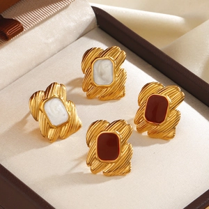 French vintage 18K gold-plated square studs with white and red enamel in a jewelry box