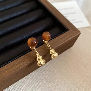 Vintage tiger eye stone gourd drop earrings with silver pins in elegant gold finish