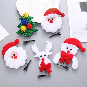 Pinzas de pelo navideñas con diseños de Papá Noel y renos para peinados festivos