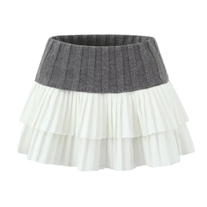 Contrast grey knitted mini skirt with white pleated ruffles and tiered layered design
