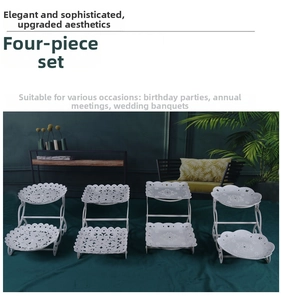 Detailed view of 4-piece white lace tiered dessert stand set with floral cutout patterns