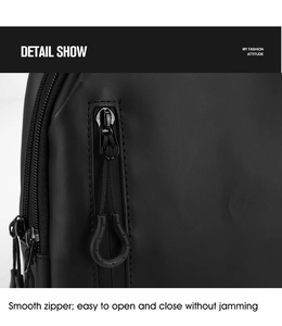 Close-up of smooth metal zipper and anti-slip rope puller on black matte chest bag