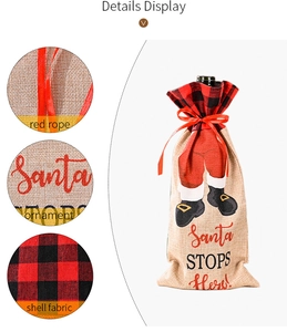Detail display of Santa wine bottle covers with red plaid trim and linen fabric texture
