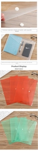 Detail of waterproof A4 plastic file folders with snap button closure on office desk