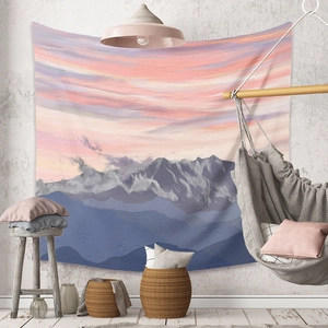 Detail of oil painting style tapestry with mountain peaks and pink sunset sky decoration