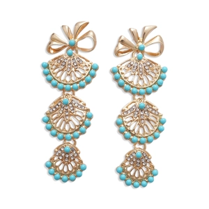 Elegant gold fan-shaped drop earrings with green beads and bow tie accents on white