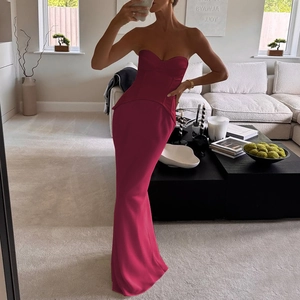 Slim fit deep magenta off-shoulder mermaid evening gown with corset bodice and peplum waist