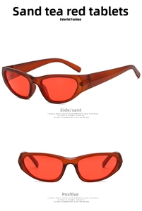 Macro detail of retro cat-eye sunglasses featuring tea brown frames and red lenses