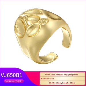 Macro detail of wide organic texture brass ring with lava gold finish and dimensions
