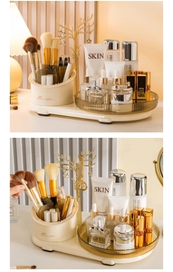 Detailed view of cream cosmetic organizer with gold jewelry tree and amber tray