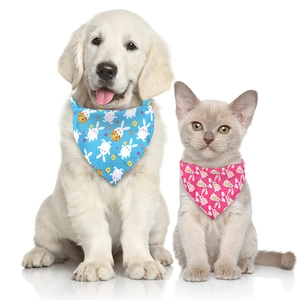 Detailed view of pink and blue Easter dog bandanas with cute rabbit and egg patterns