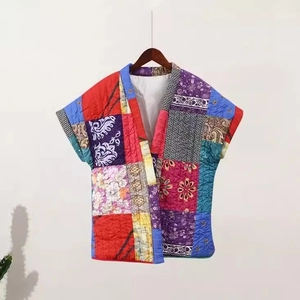 Ethnic bohemian quilted patchwork vest with vibrant floral prints and sleeveless design