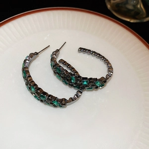 Vintage C-shaped silver needle hoop earrings with green and dark grey sparkling crystals