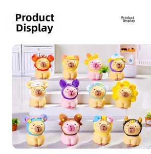 Detailed collection of 12 resin Capybara figurines with zodiac costumes on a shelf