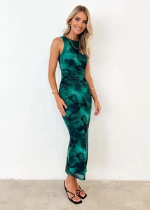 Detail of the side ruching and green abstract floral print on the slim fit maxi dress