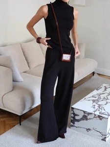 Minimalist black knitted turtleneck vest and wide-leg trousers two-piece set for women