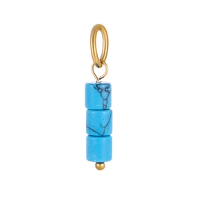 Macro shot of three blue natural stone beads with gold pendant ring and hardware