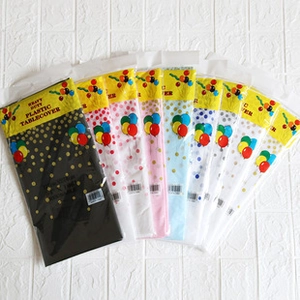 Detailed view of heavy duty plastic tablecovers in various colors for party decoration