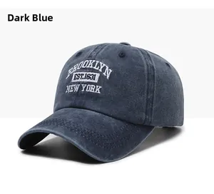 Detailed embroidery on navy blue washed cotton baseball cap with Brooklyn lettering