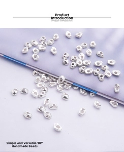 Close-up of irregular S925 sterling silver nugget beads for DIY jewelry making