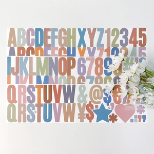 Macro detail of 2.5-inch Morandi color alphabet and number stickers for classroom decor