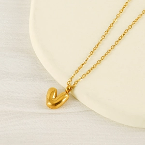 Minimalist golden bubble heart pendant necklace with elegant rounded metallic texture