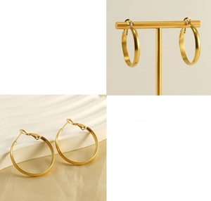 Detailed view of polished 18k gold hoop earrings with premium plated finish