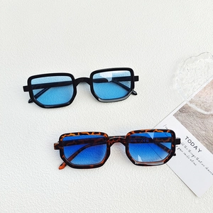 Retro small polygon sunglasses with blue gradient lenses and classic black frames