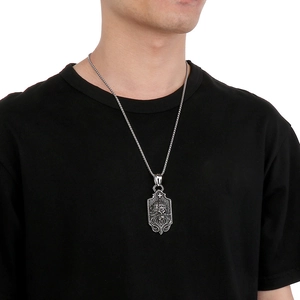 Retro stainless steel necklace for men featuring a lion head pendant and crown design