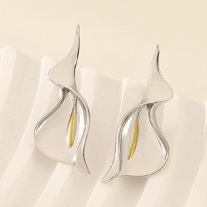 Elegant calla lily stud earrings in silver and gold plating on minimalist background