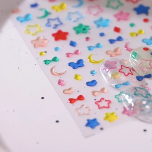 3D relief nail art stickers with stars, moons and butterflies in vibrant colors