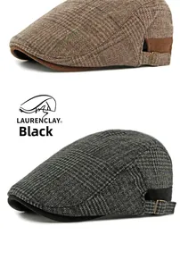 Detail of vintage wool plaid ivy caps featuring side metal buckles and warm textured fabric