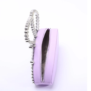 Elegant purple heart-shaped evening bag with crystal bead handle and smooth faux leather