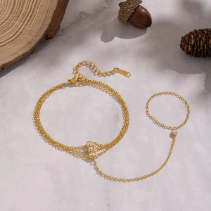 18K gold plated stainless steel slave bracelet with white zircon and finger ring detail