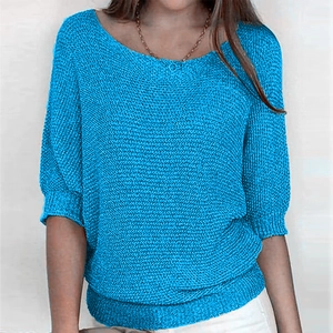 Bright blue knit top with hollow out pattern and short sleeves for a casual summer style