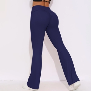 Close-up of high-waist yoga flare leggings in navy blue with scrunch butt lifting detail
