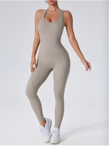 Close-up of khaki backless yoga jumpsuit with built-in pads and elastic athletic fabric