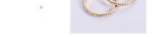 Detailed macro view of gold-plated square hoop earrings inlaid with sparkling zircons