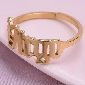 Close-up of golden Virgo zodiac open ring with adjustable band in artistic font