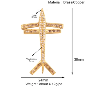 Detailed specs of gold airplane charm made of brass with 38mm x 24mm dimensions