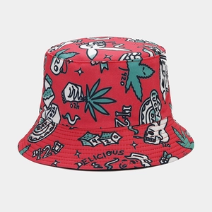 Detail of red canvas bucket hat with skull and luck motif print and fine stitching