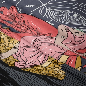 Detailed close-up showing the fine twill fabric and surreal astrology prints on the tapestry