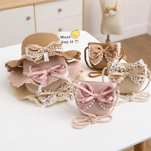 Straw sun hat and matching crossbody bag set with lace and floral bows for girls