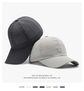 Detail of laser-perforated breathable fabric on black and gray quick-dry baseball caps