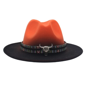 Detail of the orange and black bicolor wool fedora featuring a vintage silver bull head buckle